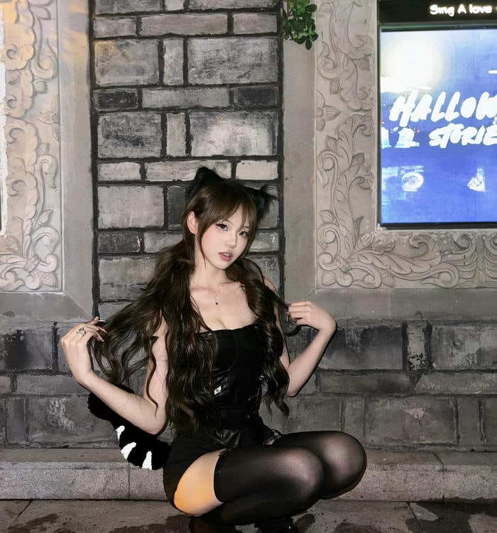 Cosplay mèo tóc buộc phong cách