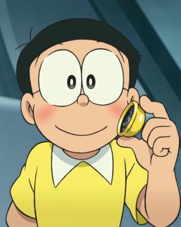Ảnh Nobita mỉm cười vui vẻ khi nghe điện thoại bàn