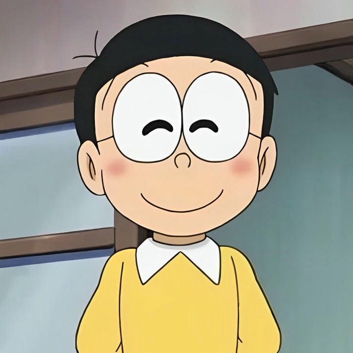 Nobita cute mỉm cười rạng rỡ với đôi mắt to tròn